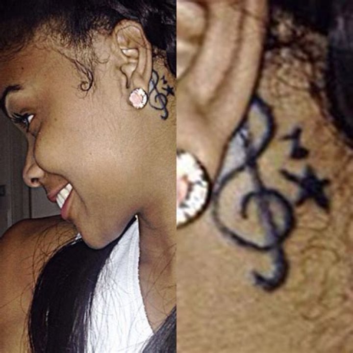 Ajiona Alexus Music Notes, Star, Treble Clef Behind Ear Tattoo