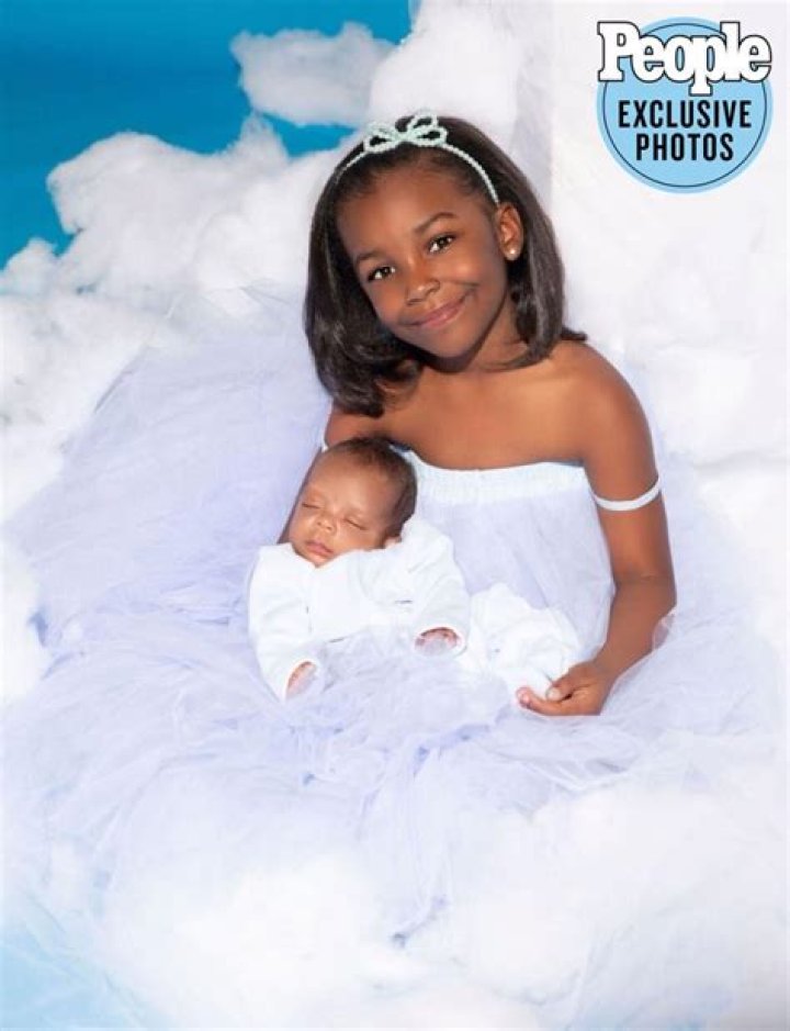 Angel Basketball Wives Baby Daddy and Daughter