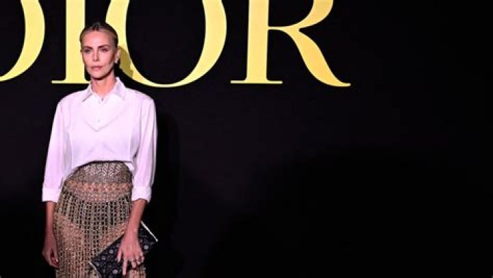 Charlize Theron Paired a Totally See-Through Beaded Maxiskirt With Black Underwear and a Button-Down