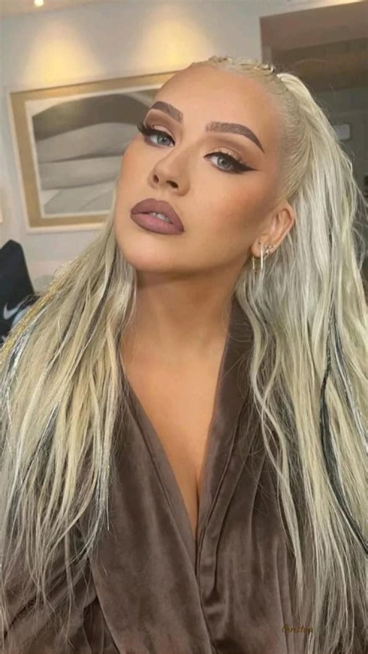 Christina Aguilera Paired Her Black Work Pants With a Latex Bustier