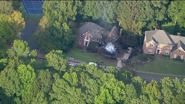 Crews work to put out Alpharetta house fire