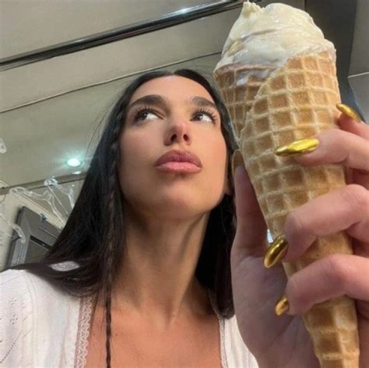 Dua Lipa's Loosely-Laced Corset Expertly Showed Off Her Belly Button Ring