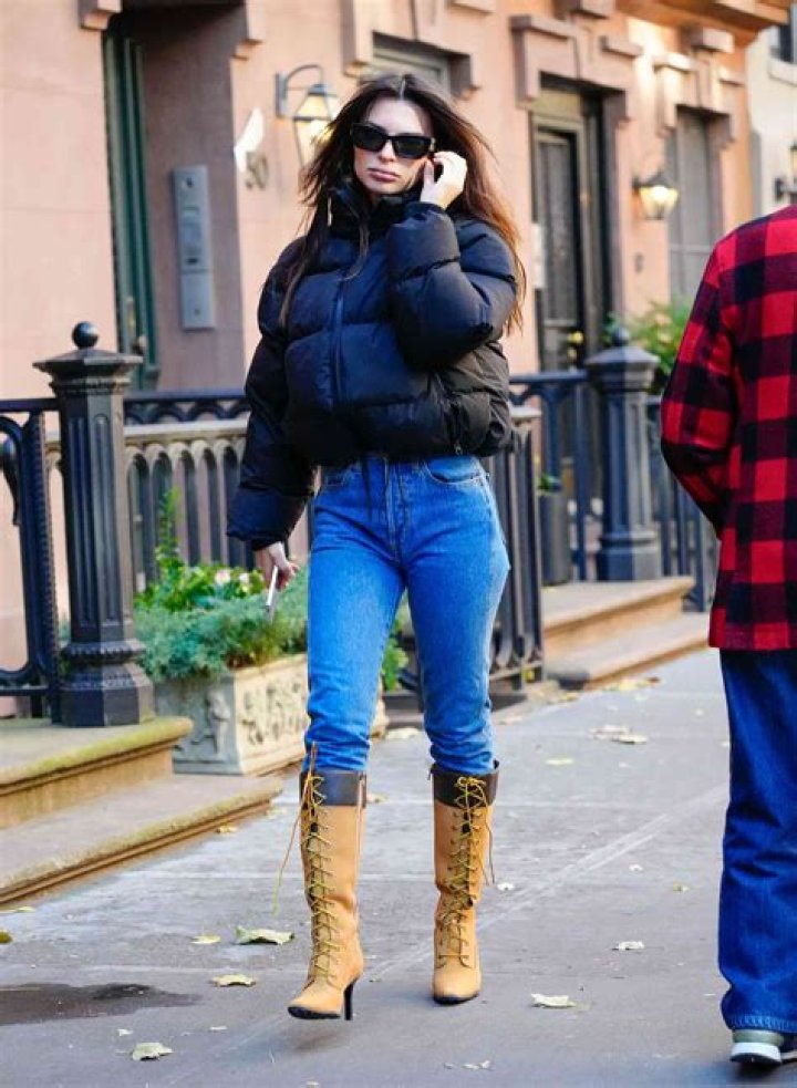 Emily Ratajkowski Wore Sexy Lace-Up Boots With a Puffer Jacket