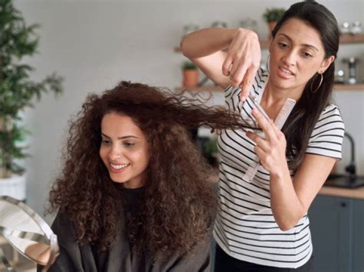 Everything You Need to Know Before Getting Curly Bangs