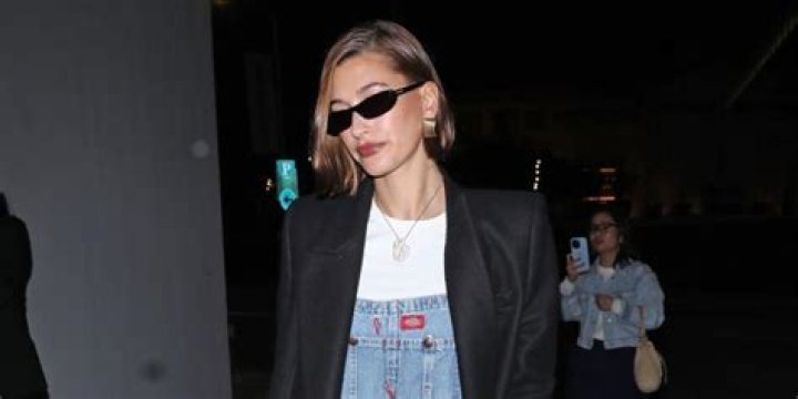 Hailey Bieber Wore a $2,800 Coat With $45 Denim Overalls From Amazon
