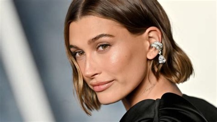 Hailey Bieber Wore the Tiniest Blue Bikini While Plunging in a Tub of Freezing Cold Water