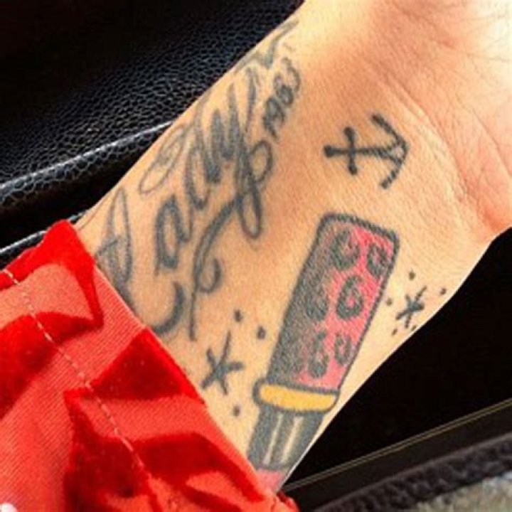 Hanna Beth Merjos Anchor, Lipstick, Writing Wrist Tattoo