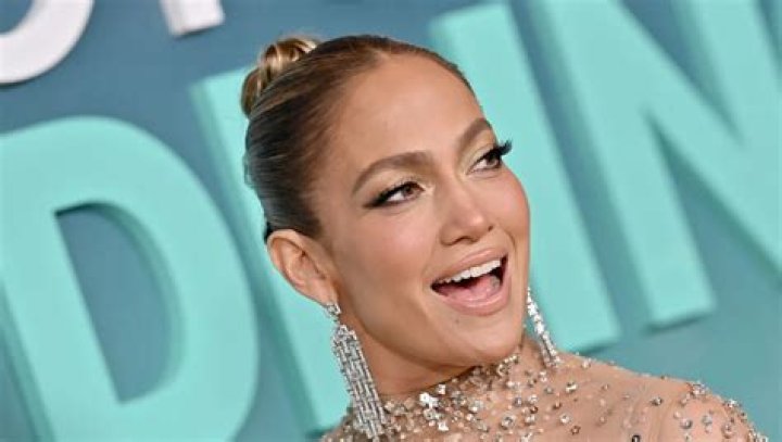 Jennifer Lopez's Throwback Thursday Look Included a Fitted Pantsuit With the Deepest Plunge