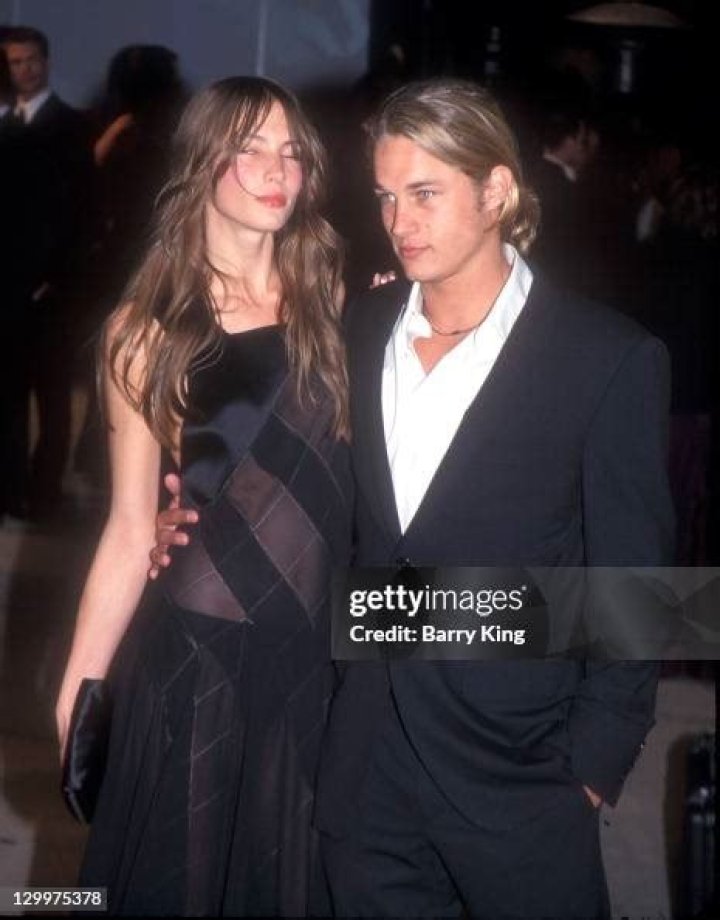 Jessica Miller and Travis Fimmel