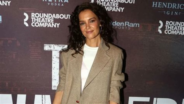 Katie Holmes Paired a Basic Beige Blazer with a Fringed-Leather Carwash Skirt