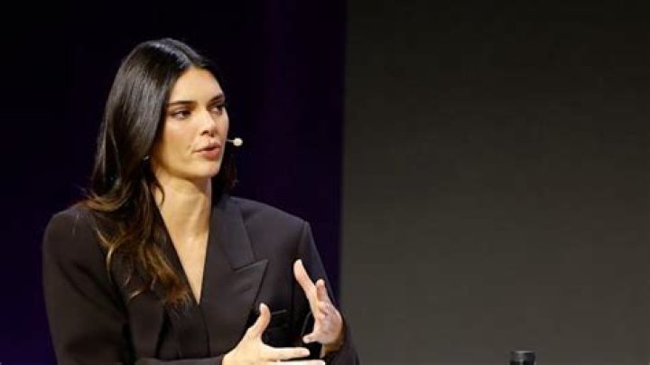 Kendall Jenner’s Version of a Skirt Suit Included a Plunging Blazer Minidress and a Sleek Maxiskirt