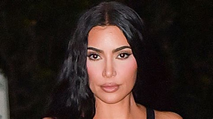 Kim Kardashian's Beach Day Activities Include Doing Cartwheels In a Thong Bikini