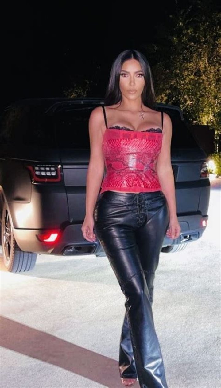 Kim Kardashian Paired a Leather Crop Top With Lace-Up Pants