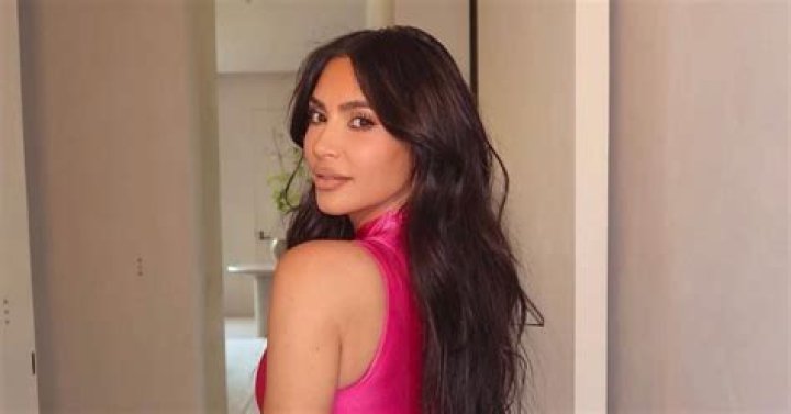 Kim Kardashian Took a Style Cue from the ‘Power Rangers’ in a Metallic Hot Pink Catsuit and Hip-High Boots