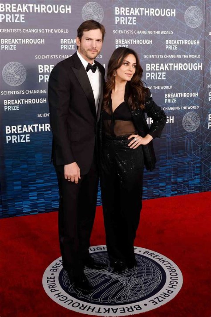 Mila Kunis Wore a Sheer Top Underneath Her Sequined Suit for a Red Carpet Date With Ashton Kutcher