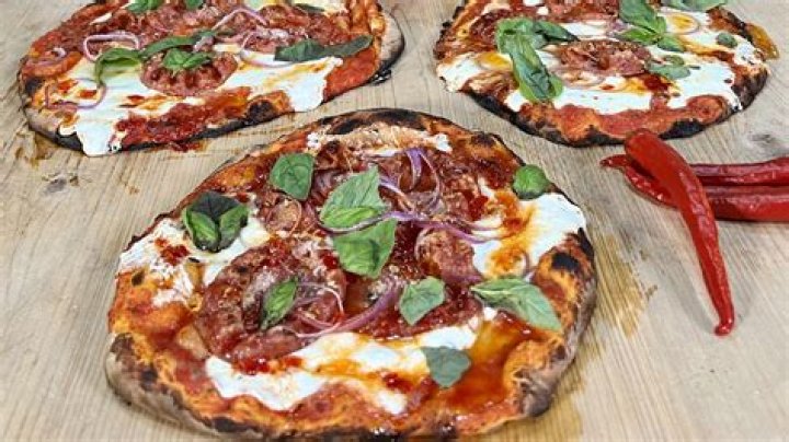 Thin and Crispy Pizza with Sopressata, Red Onion and Hot Honey | Rachael Ray | Recipe