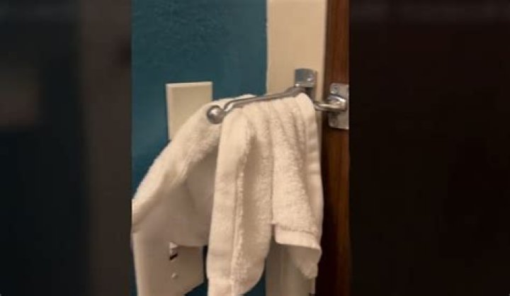What Does a White Towel on a Hotel Room Door Mean? Decoding the Signal