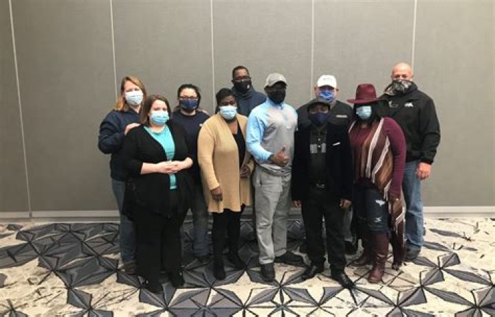 Workers at Tyson Foods pork plant in Iowa return to work